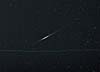 � O. Aders; Iridium 18, -5 mag hell, 06.09.02, 21.57 Uhr, 3 min. belichtet auf Kodak Royal 200. Die Kratzer sind leider im Fotolabor verursacht worden.